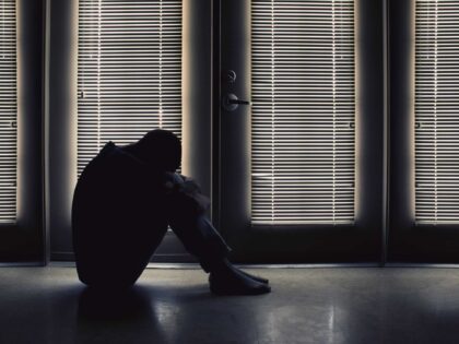 A man suffering from illness, anxiety, depression and loneliness.